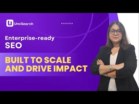 imgi76hqdefault 1 | UnoSearch Professional woman in a blazer standing with arms crossed on a purple hero banner with text Enterprise ready SEO and Built to scale and drive impact and a UnoSearch logo in the corner