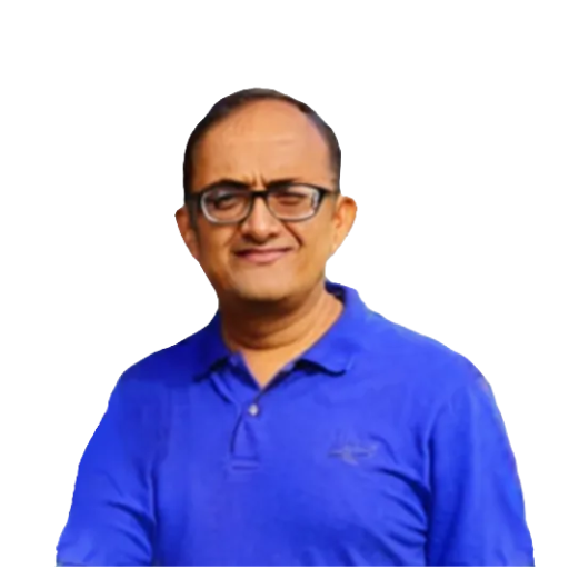 Rajiv12 | UnoSearch Man with short hair and glasses wearing a blue polo shirt smiling slightly against a white background